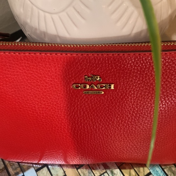 Coach Leather Wristlet
COACH - Picture 4 of 17